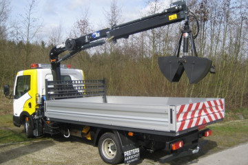 Laadkraan Copma 40.2 met open laadbak op Nissan in Tremelo