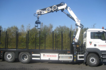 Laadkraan Copma 210.4 met open laadplateau op MAN in Arendonk