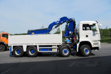 Laadkraan Copma 300.4 met open laadbak op MAN in Ham