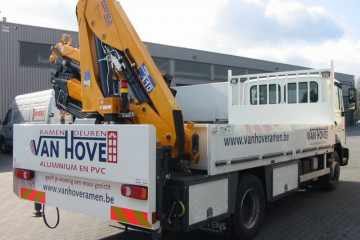 Laadkraan Copma 110.4J1 met open laadbak op Renault in Oelegem