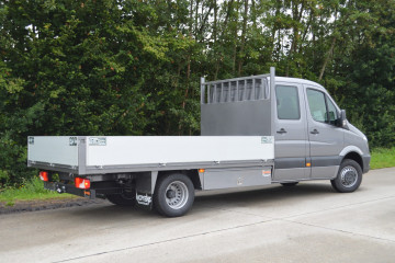 Open laadbak met alu zijborden op Mercedes in Kasterlee